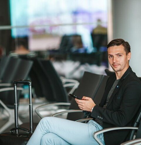 passenger-airport-lounge-waiting-flight-aircraft-young-man-with-smartphone-airport-wait_109800-19386 passenger-airport-lounge-waiting-flight-aircraft-young-man-with-smartphone-airport-wait_109800-19386
